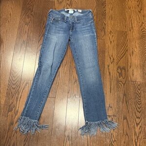 Sneak Peek Blue Ankle Jeans with Fringe Hem